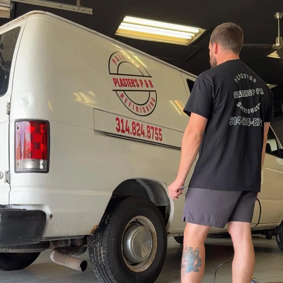 Blane Plaster Jr. in the shop with the Plaster's P&R van
