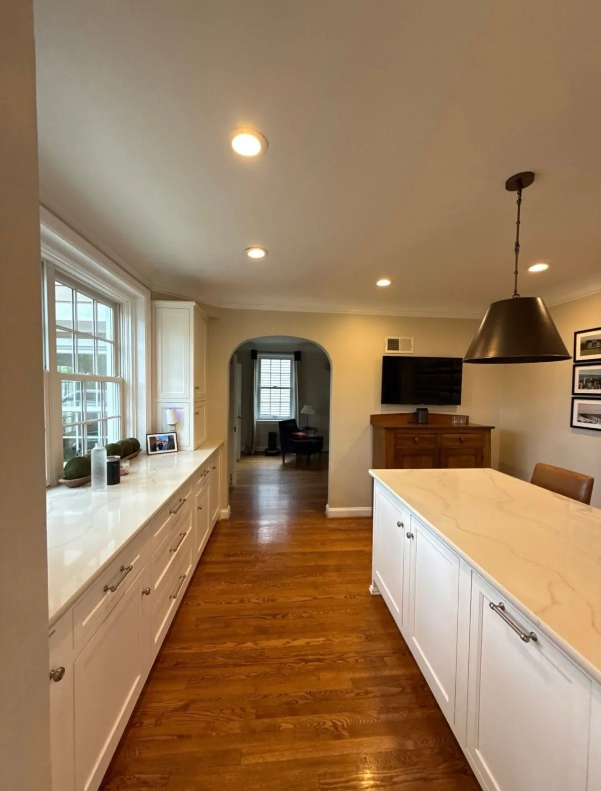The same kitchen after painting - warm walls, a clean white ceiling and crisp trim